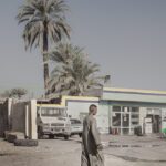 A Man and Two Palms
